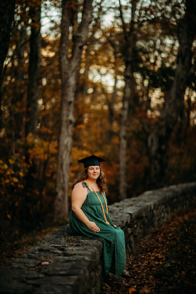 College graduation portraits with scenic backdrop